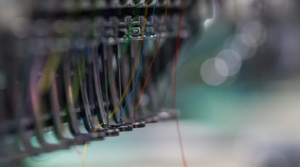Detailed Embroidery process in Custom Branded Workwear and Merchandise