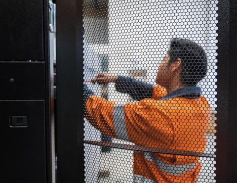 People-First-Approach-EPT-Employee-repairing-a-UPS