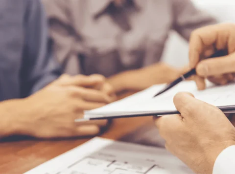 Home-Loans-Couple-about-to-sign-documents