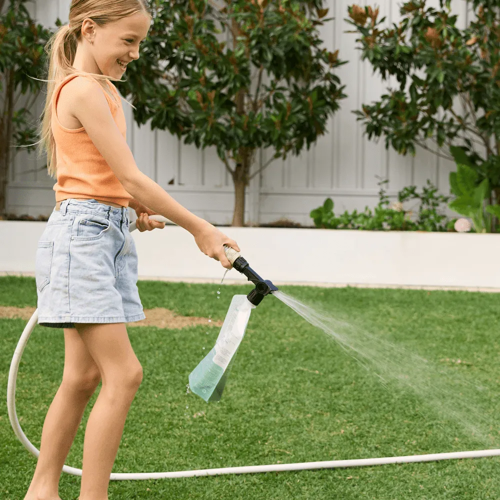 Australian-Lawn-Care-girl-using-lawn-care-product