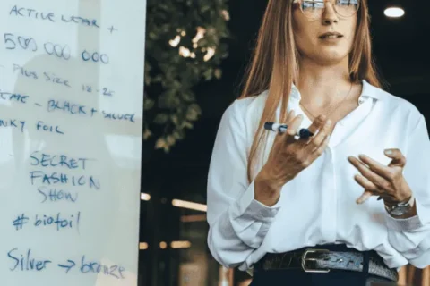 Marketing-Strategy-Woman-discussing-a-viable-strategy-with-a-team-600x400