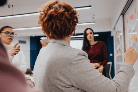 A group of Marketing Consultants discussing about Brand Strategy